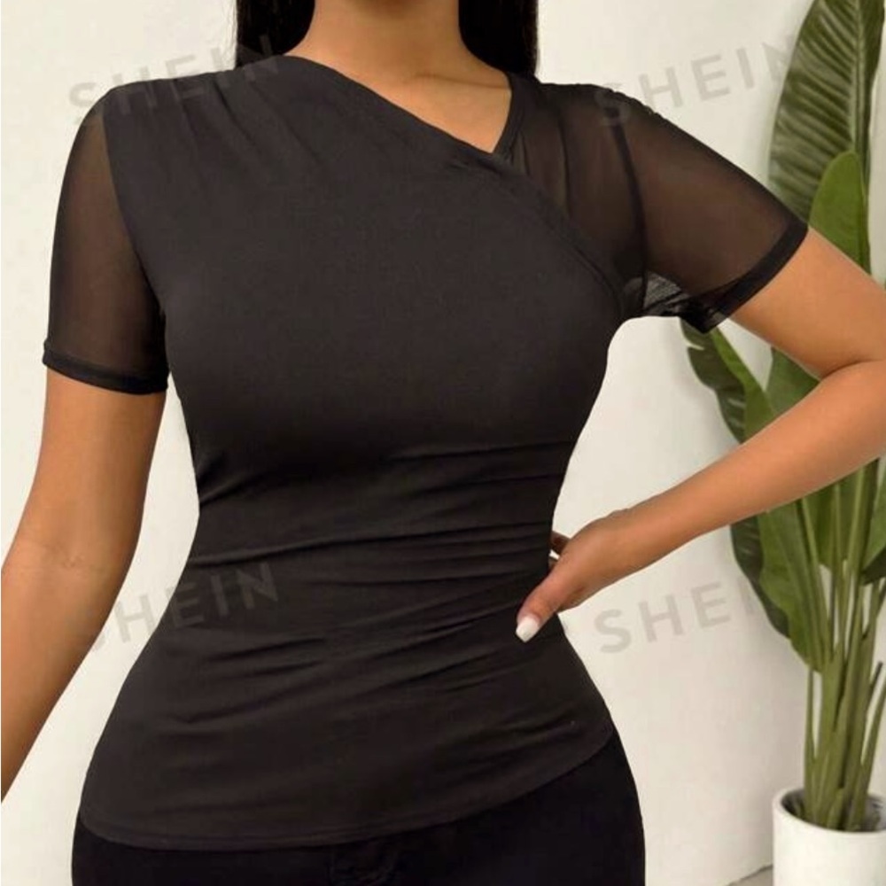 Black tee with mesh sleeves